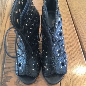 Stuart weitzman black leather lace up booties
